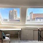 Rooftop Triplex With Garden At Notre Dame