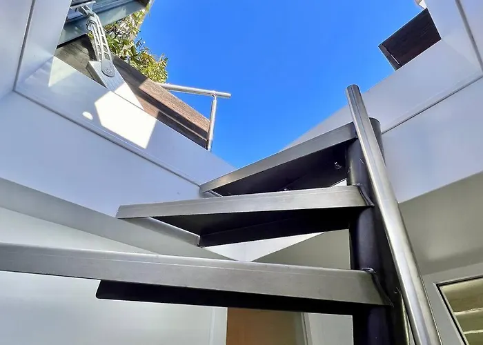 Апартаменты Rooftop Triplex With Garden At Notre Dame